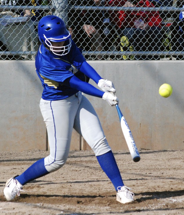 Tahoma's Haley Beckstrom hits an RBI double in a 9-0 victory over Kentwood Tuesday.