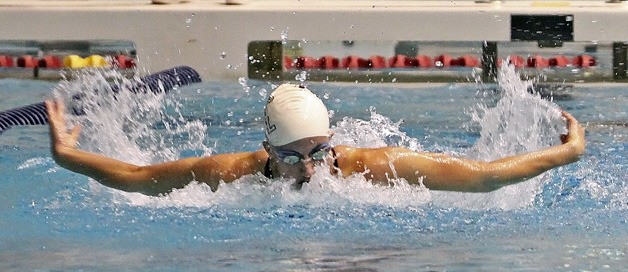 Kentlake’s Emily Tanasse put together a fifth place finish in the 100-yard butterfly at the 4A state girls swim and dive championships on Saturday at the King County Aquatic Center to help the Falcons earn their highest finish in school history.