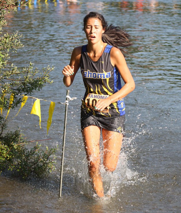 Julianna Mock from Tahoma High runs in the Lake Wilderness Invitational Saturday at Lake Wilderness Park.