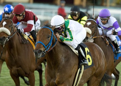 Washington-bred Reba Is Tops (No. 6) and jockey Pat Valenzuela win the $61