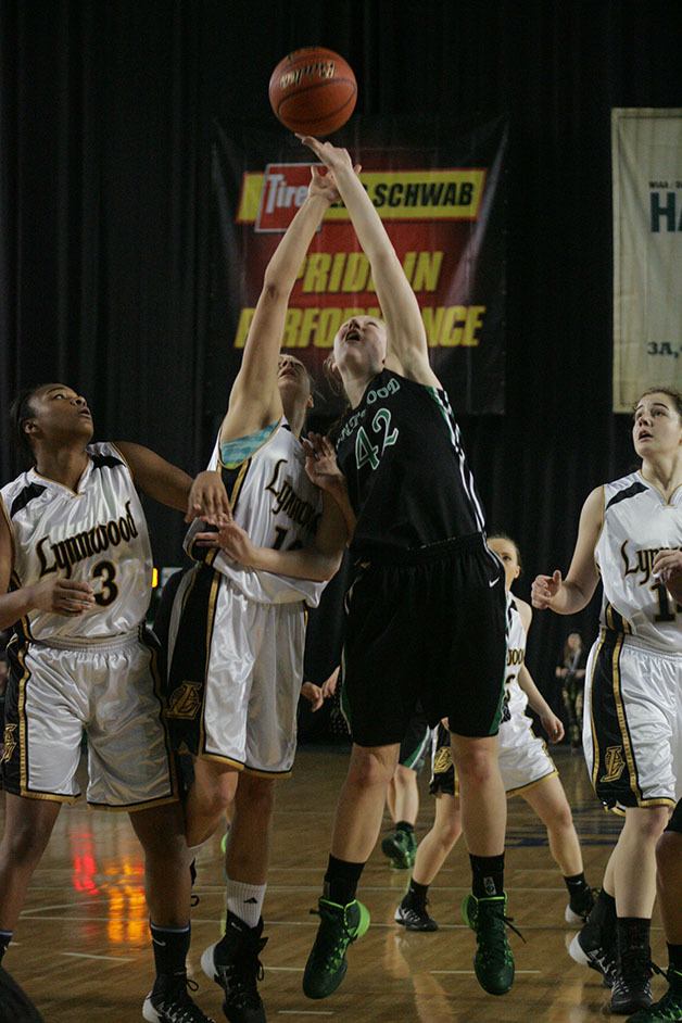 Kentwood forward Jenny Johnson goes up for a rebound against Mikayla Pivec from Lynnwood during the first round of the state 4A girls championship tournament Thursday