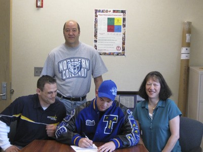 Tahoma High wrestler Nick Bayer signs a letter of intent with the University of Northern Colorado.