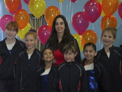 The Summit Gymnastics Girl's Artistic Team  Pictured (Left to right) Hayley Rayburn