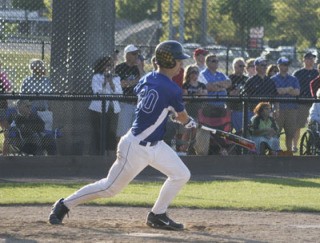 Tahoma's Heyden Johnson laced a base hit up the middle to bring in Zach Aaker