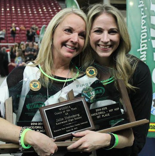 Holmberg poses with assistant coach Teresa Wilson after the state championships March 28 in Yakima.