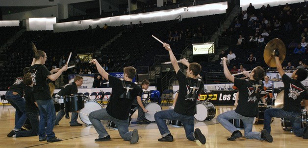 Tahoma's drumline performs during halftime of the boys South Puget Sound League championship game Thursday night at ShoWare Center in Kent.