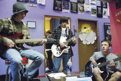 The teenage rock group 3rd Attempt play at Dace's Rock 'N More Academy.