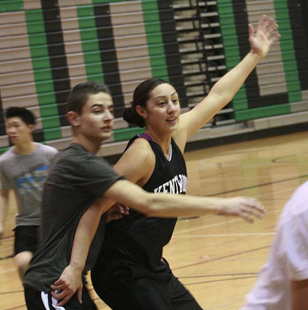 Kentwood senior Sarah Toeaina posts up a defender while practicing against the boys team on Feb. 27