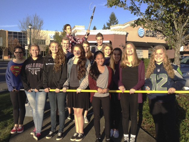 Kentlake students installed lights during the Purple Light Nights campaign. Front row from right to left: Lily Louuien