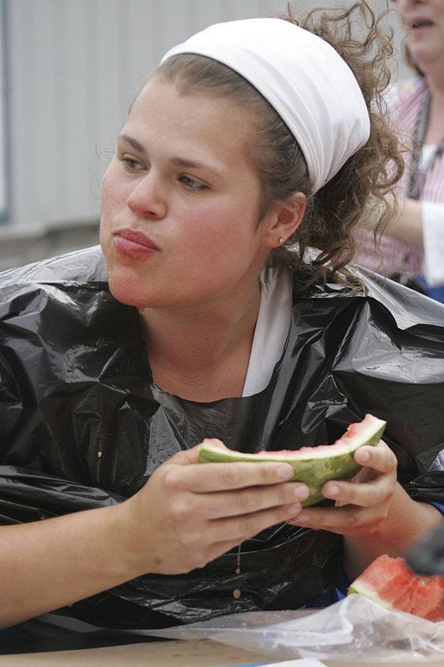 Aubrey Durbin competes in the Maple Valley Farmers Market watermelon eating contest.