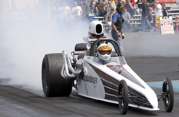 Bob Woodruff of Maple Valley wheels his rebuilt super comp dragster down the drag strip earlier this season.