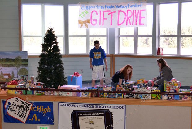 Tahoma Junior High students help pack up presents donated by their classmates during the toy drive for the Maple Valley Food Bank. Several other Tahoma schools also collected presents for those in need.