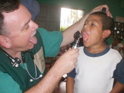 Dr. Kirby Lautman from Auburn examines a Nicaraguan boy during the February/March Corner of Love mission trip. Two medical-dental teams traveled to San Ramon.