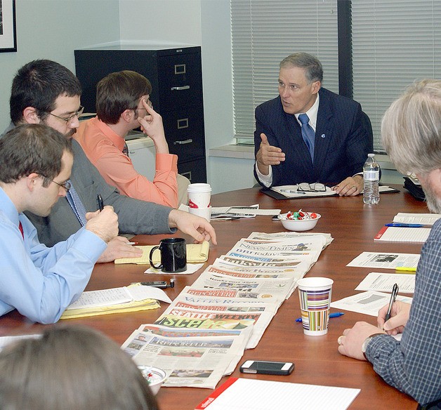 Gov. Jay Inslee  answers questions from Sound Publishing reporters and editors about his biennial budget proposal Dec. 18 at the Bellvue Reporter office.