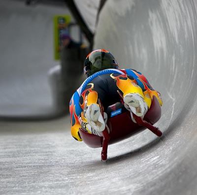 Christian Niccum and his luge partner Dan Joye race down the track in Altenberg