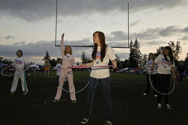 Relay for Life participants hula hoop during the event in June at Kentwood High. Organizers hope to get more youth involved in the event in 2013.