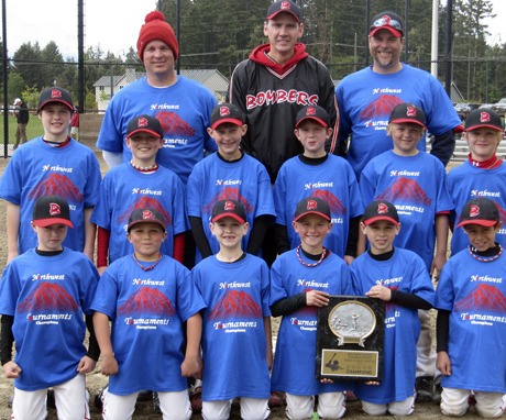 The Maple Valley Bombers U9 team celebrate a recent tournament championship.