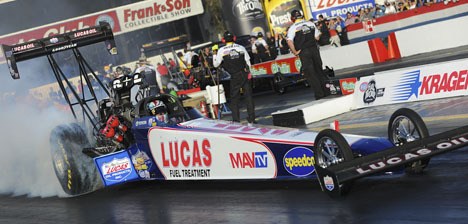 Shawn Langdon does a burnout at Pomona earlier this season. He will be at Pacific Raceways this weekend in his top fuel dragster which is worked on by Kent native Wes Barber.