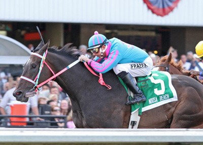 Noosa Beach ridden by jockey Ricky Frazier won the 75th running of the Longacres Mile at Emerald Downs Aug. 22