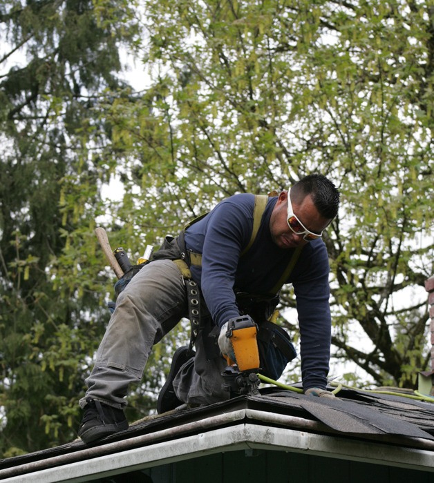 Stevenson Roofing and members of the Lake Sawyer Christian Church’s James Brigade worked together to replace a leaking roof for a woman whose husband died in October. The couple had been married 40 years.