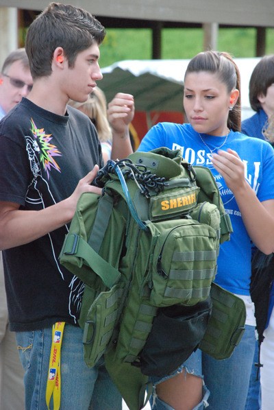 Anthony Chagollan and his sister Danielle learned about weapons used by police during the Citizens Academy in 2009.