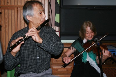 Kevin Gow and Laura Lovell from the group Dinas o Frain (City of Crows) perform at the Welsh Day celebration at the Black Diamond Museum Saturday