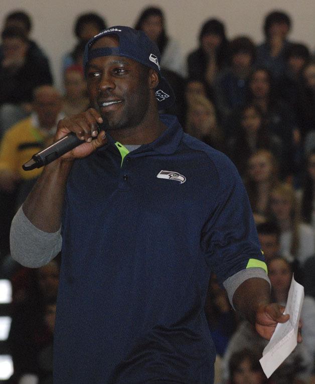 Seattle Seahawk Leon Washington speaks to students at Tahoma Junior High School Tuesday at an assembly.