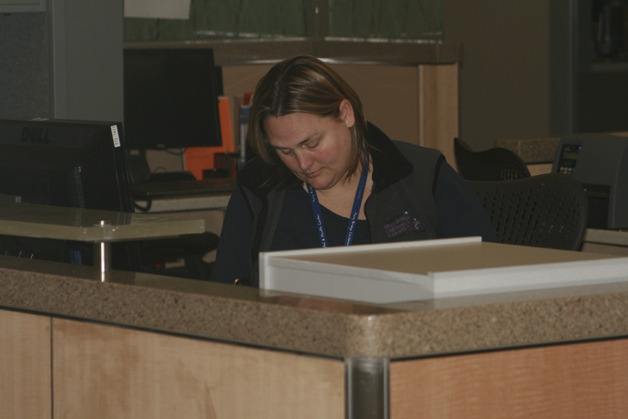 Tawnya Henningsen prepares for the opening of the Multicare Covington Emergency Department. The department opened to patients Tuesday.