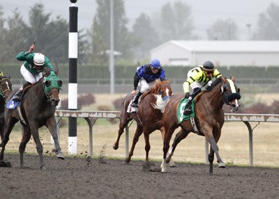 Michael and Amy Feuerborn's Class Included with jocjkey Juan Gutierrez aboard forges to the lead in the $18