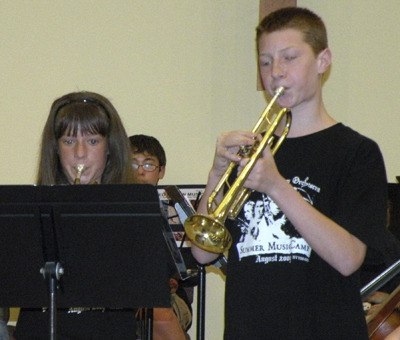 Megan Simmons and Ryan Bowden play the trumpet in the Maple Valley Youth Symphony Orchestra.