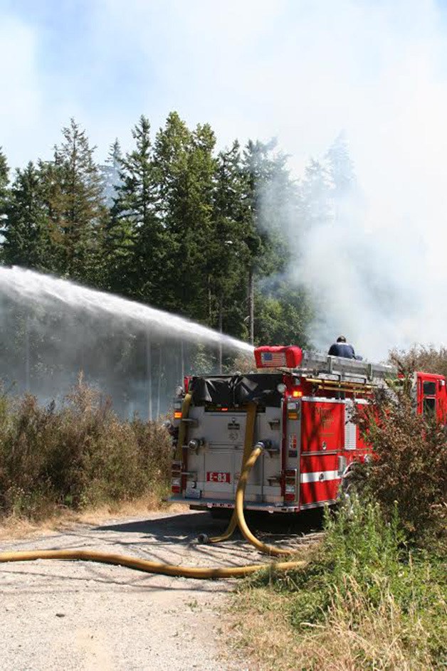 Maple Valley Fire and Life Safety responded to a brush fire at the Elk Run Golf Course around 2:50 p.m. July 4. Community member Jim Travis sent photos to The Reporter of the blaze.