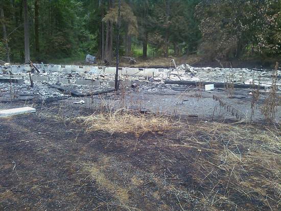 The remains of an abandoned home destroyed by a fire on Friday