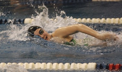 Kentwood’s Natalie Lesnick swims to victory in the 500 yard freestyle in a meet against Kentlake on Sept. 16 at the Covington Aquatic Center.