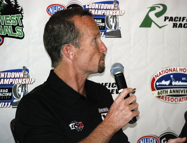 Funny car driver Jack Beckman answers a question during Thursday's pre-race kickoff press conference at the Space Needle. The National Hot Rod Association's 24th Annual O'Reilly Auto Parts Northwest Nationals runs Friday-Sunday at Pacific Raceways.