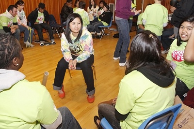 Kent Police Youth Council Leader Lisa Pham critiques the groups skit on responsibility during the “Game of Life