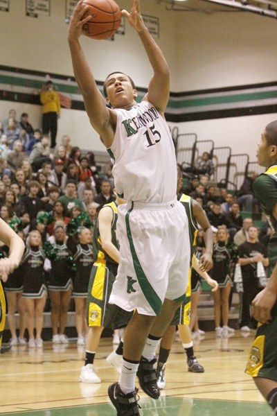 Kentwood’s Jason Boyce lays it in for two against Kentridge Dec. 18.  Kentridge goes on to beat Kentwood 65-57.  Boyce put up 15 points for the night.