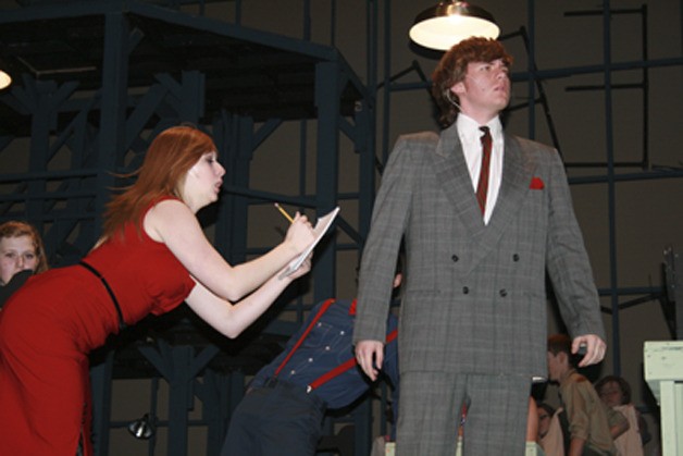 Caitlin Callahan and Austin Tinnel in the opening scene of 'The Pajama Games' at Kentlake High School.