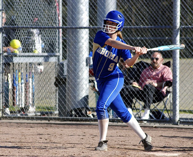 Tahoma’s Courtney Cloud loads up to hit the ball against Kentlake April 25. The Bears beat the Falcons 11-2