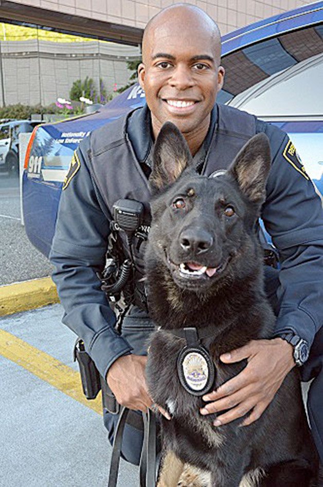 Officer Chris Greenwade with K9 officer Titan.